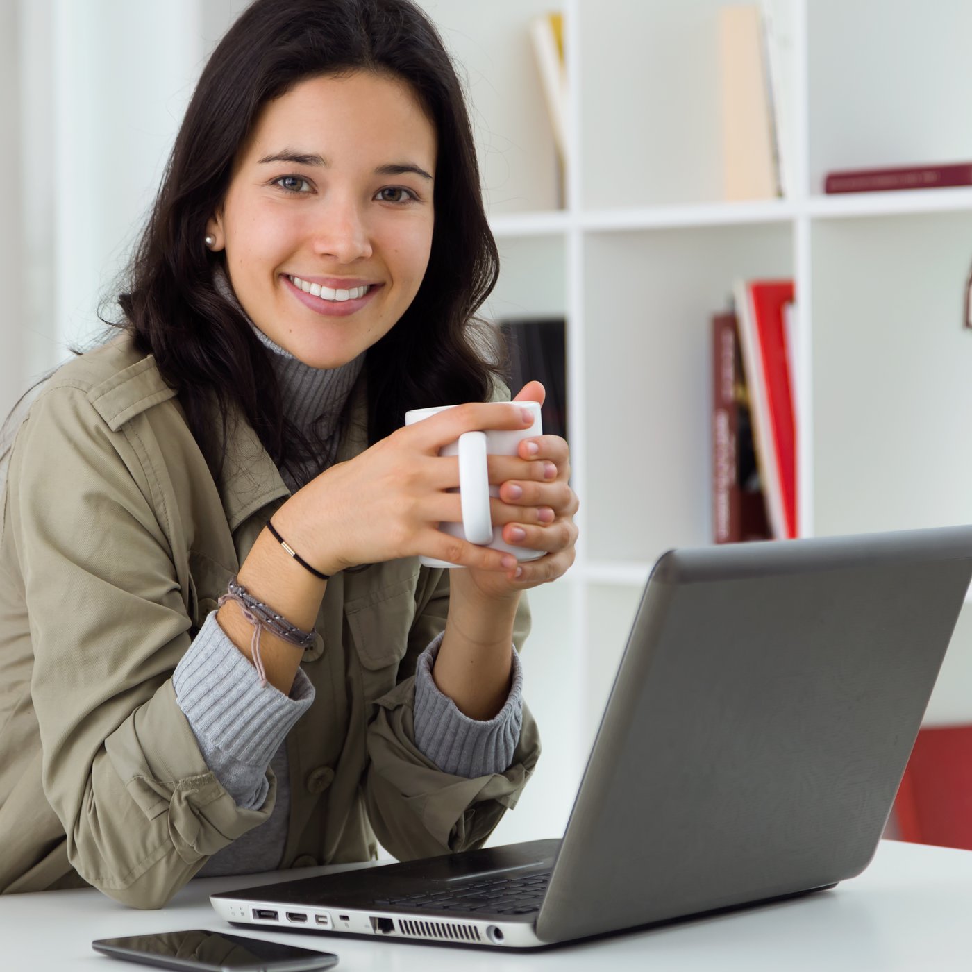 Founder of Passion Fruit Solutions at her workspace