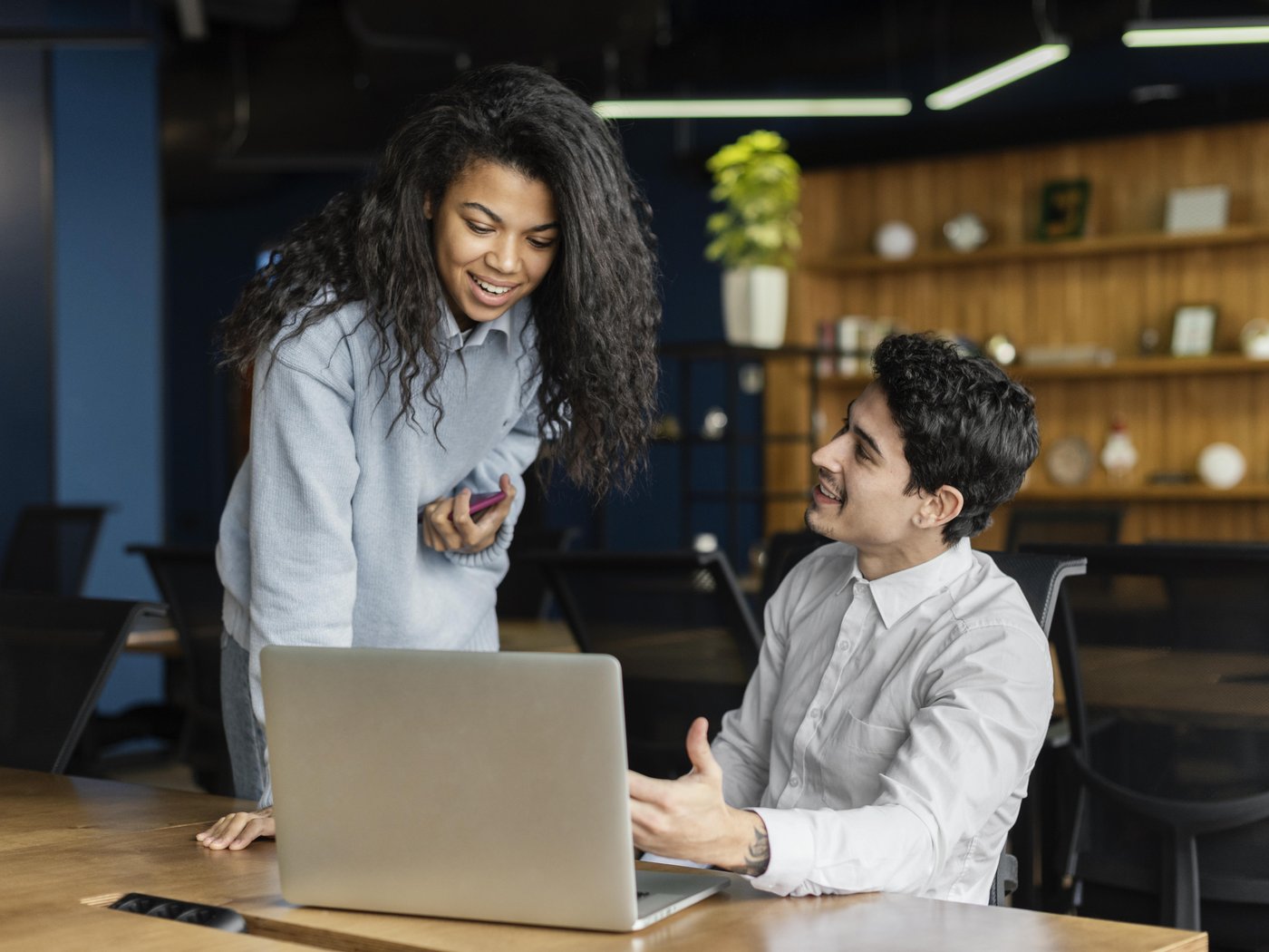 LATAM operators collaborating in a modern workspace